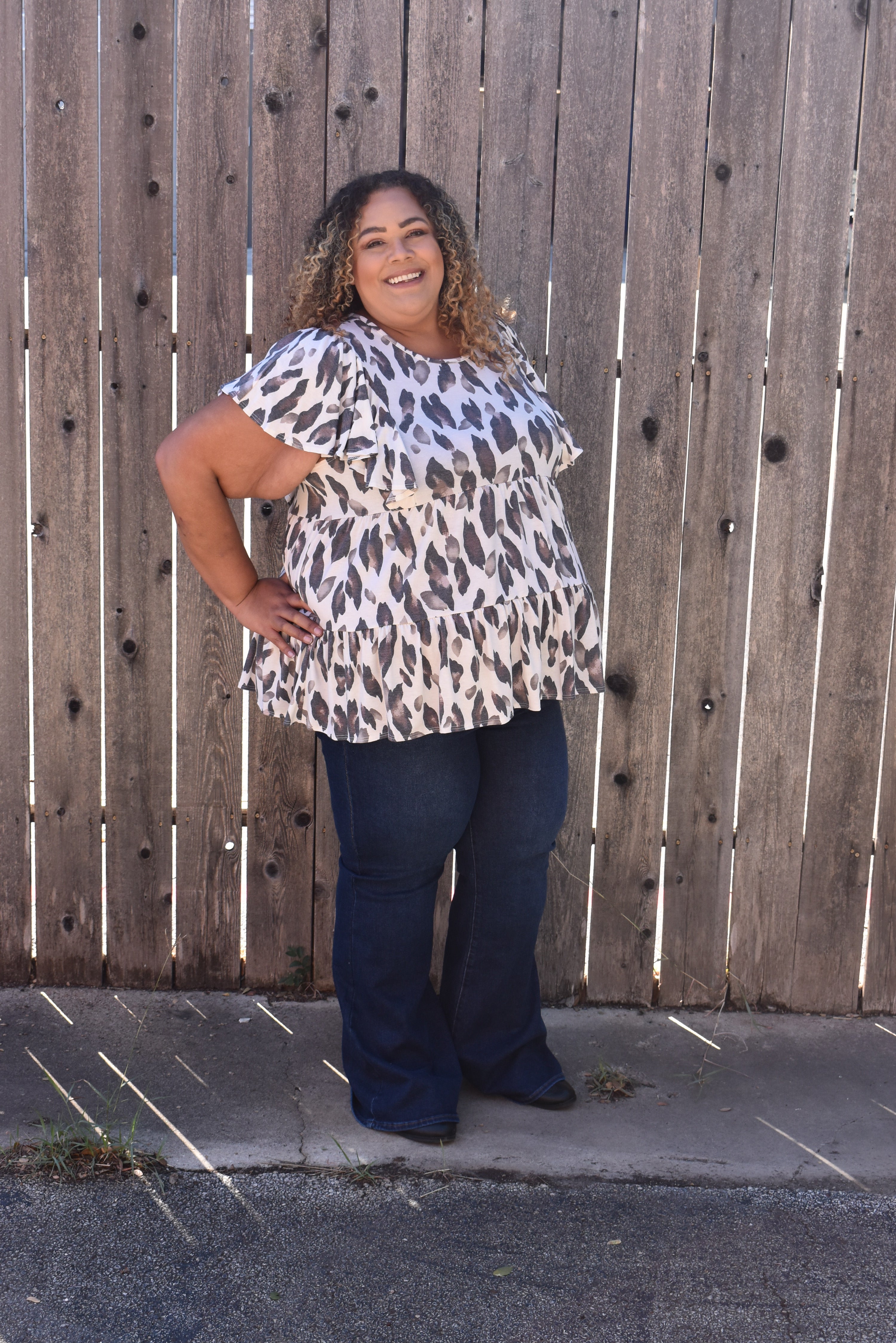 Animal print ruffle sleeve blouse.